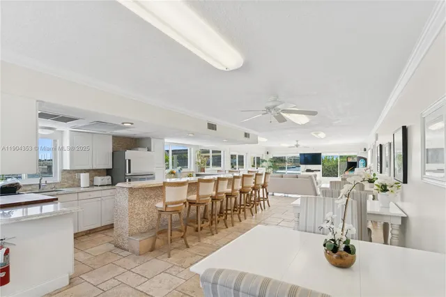 a room with lots of counter top space and furniture