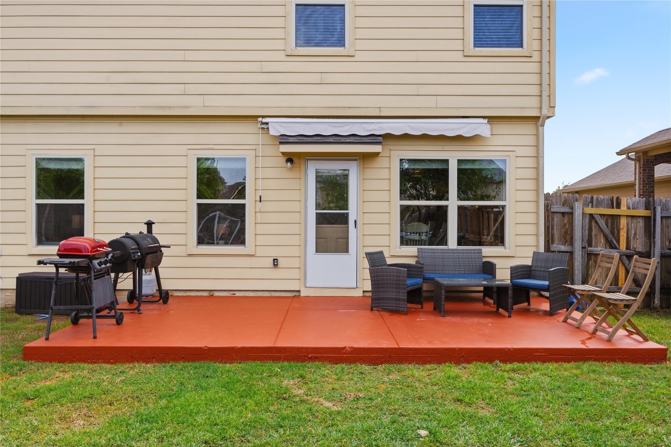509 Pinnacle Drive Georgetown, TX 78626 - Photo 23 of 25 a view of a house with backyard porch and sitting area