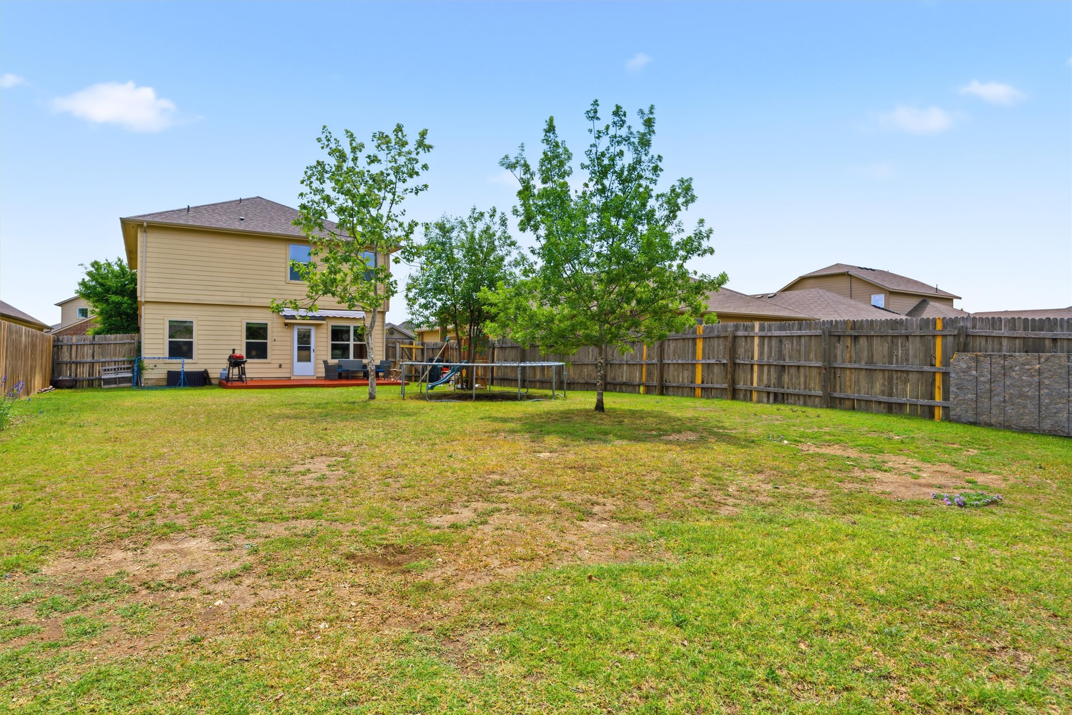 509 Pinnacle Drive Georgetown, TX 78626 - Photo 24 of 25 a view of a house with a yard