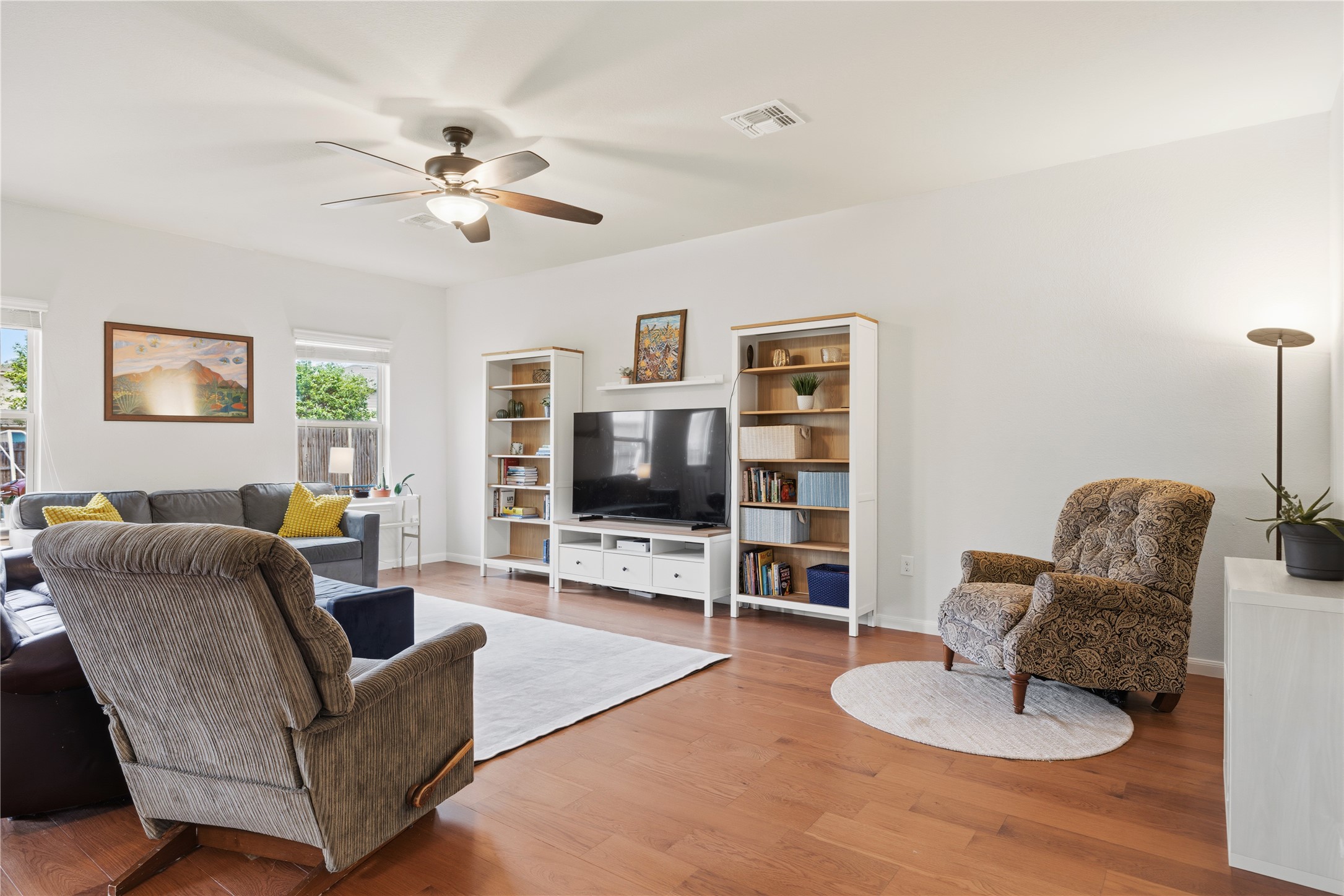 509 Pinnacle Drive Georgetown, TX 78626 - Photo 5 of 25 a living room with furniture and a flat screen tv