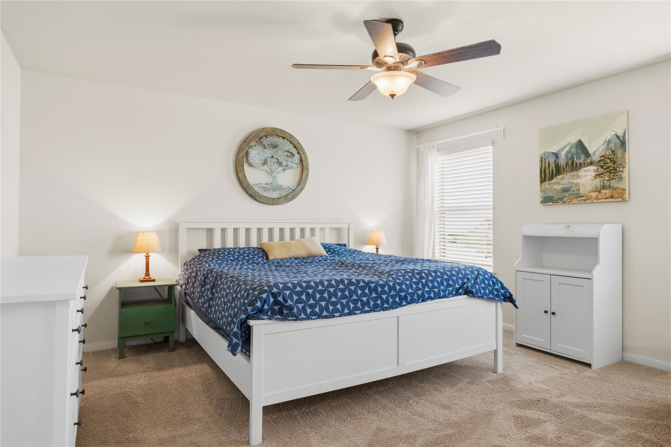 509 Pinnacle Drive Georgetown, TX 78626 - Photo 7 of 25 a bedroom with a bed and a table with a bookshelf
