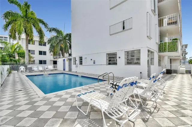 a view of an buildings from the balcony
