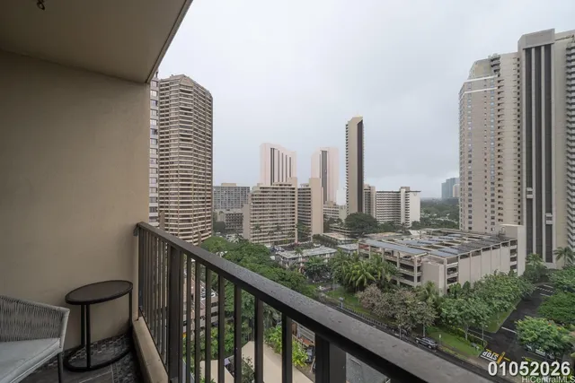a view of balcony with city