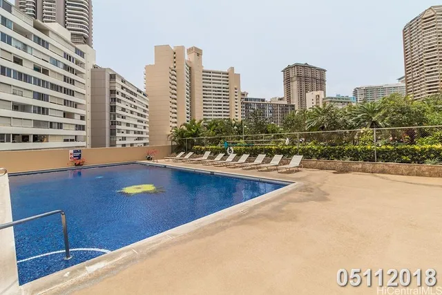 a view of city with tall buildings