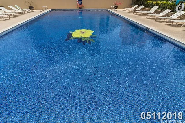 a kitchen with a sink and a stove