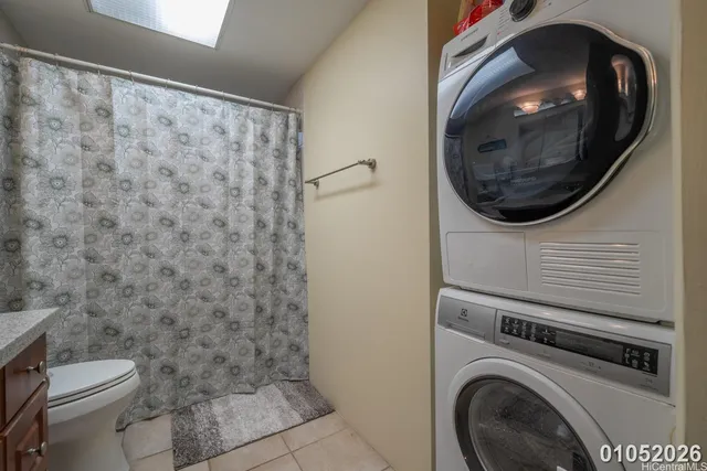 a bathroom with a toilet and a sink