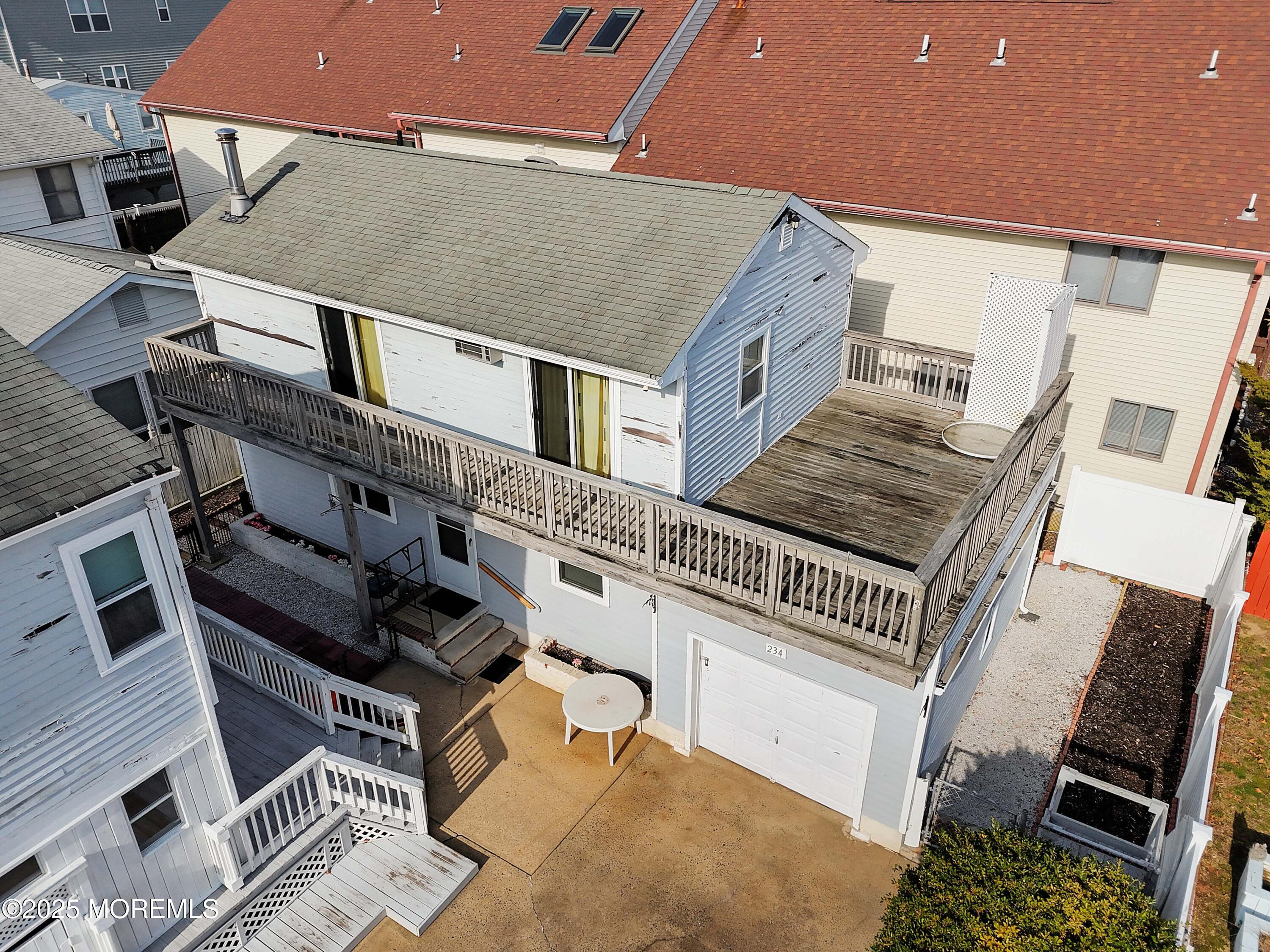 234 Hancock Avenue Seaside Heights, NJ 08751 - Photo 13 of 38 an aerial view of a house with a balcony