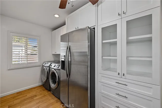 a storage room with washer and dryer