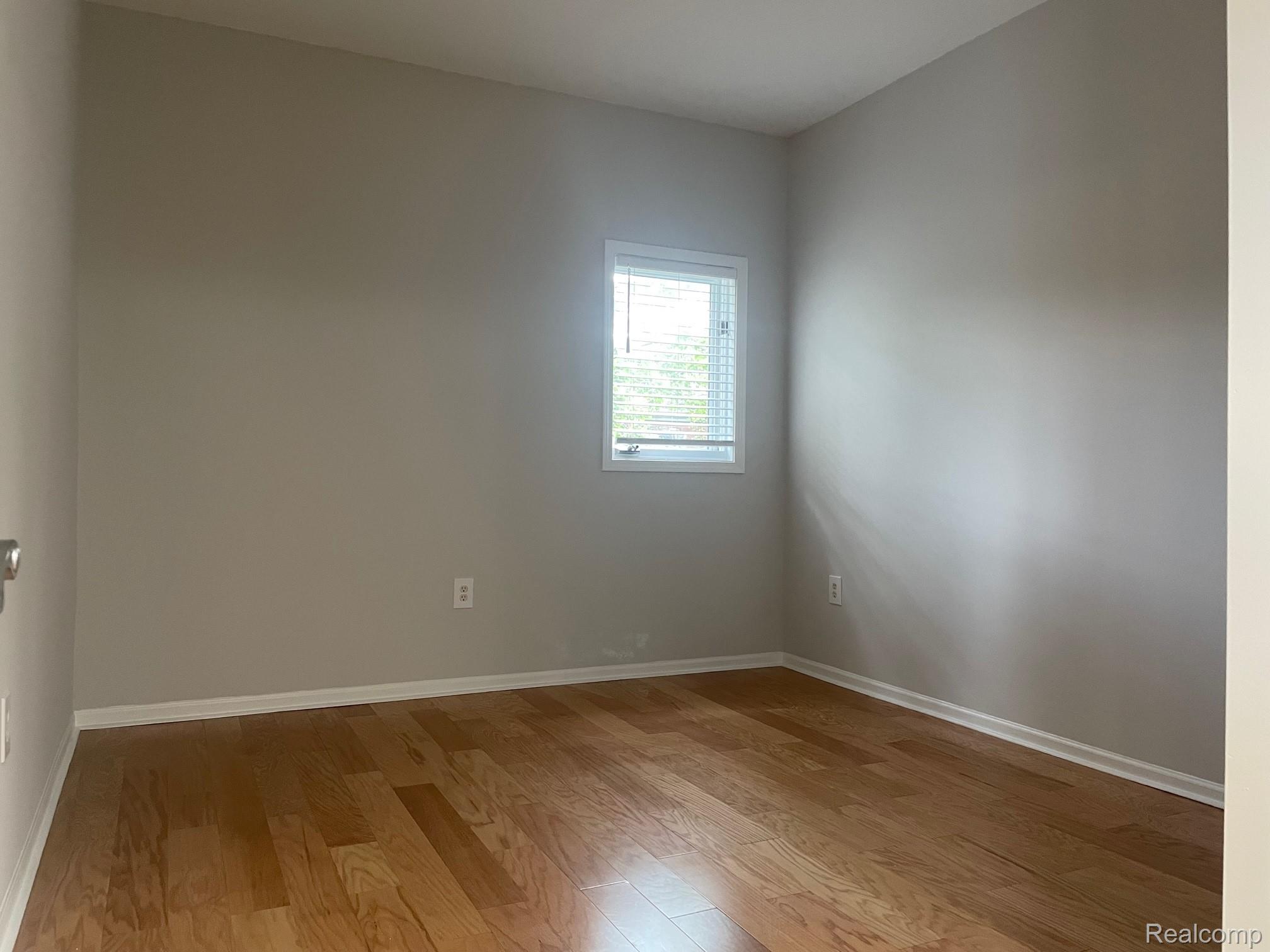 2727 East Maple Road Birmingham, MI 48009 - Photo 25 of 29 Hardwood-style flooring throughout