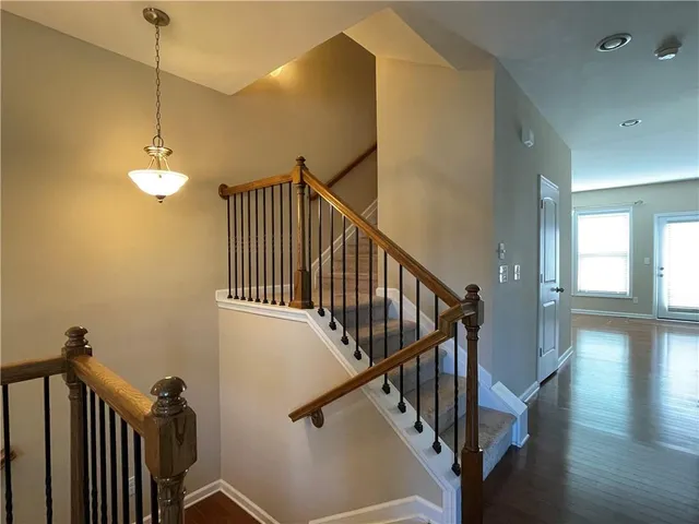 a view of entryway with wooden floor