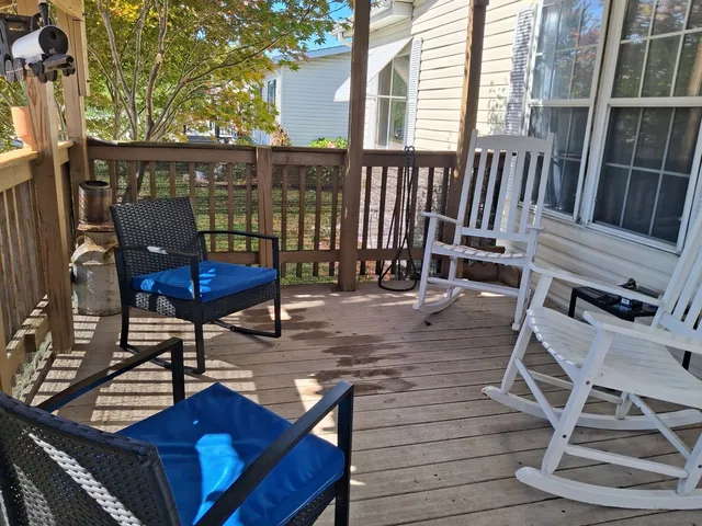 a view of a chairs and tables in the patio