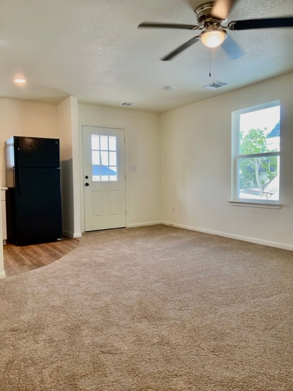 2002 West 2nd Street, Unit 802 Taylor, TX 76574 - Photo 3 of 13 a view of an empty room with a window