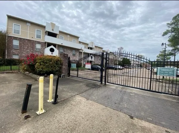 a view of a house with a street