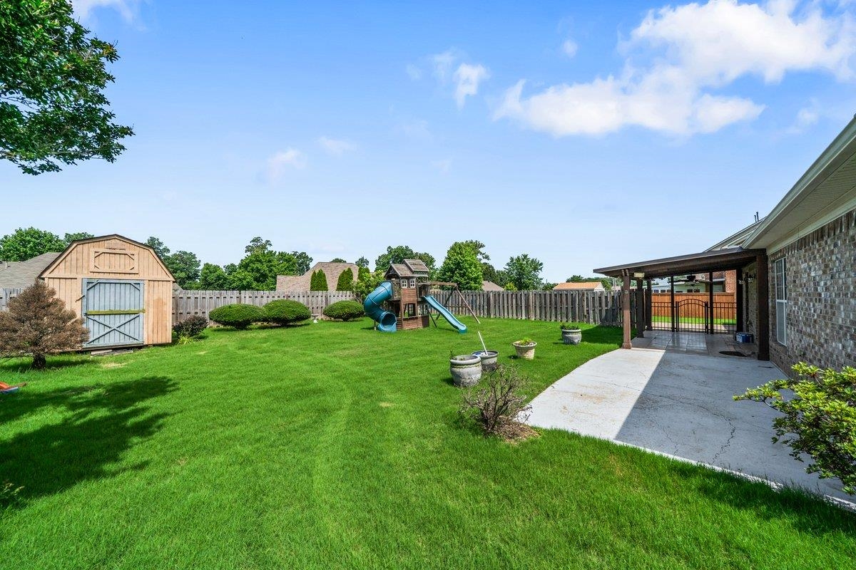 583 Rosemark Road Atoka, TN 38004 - Photo 25 of 25 a view of a backyard with garden