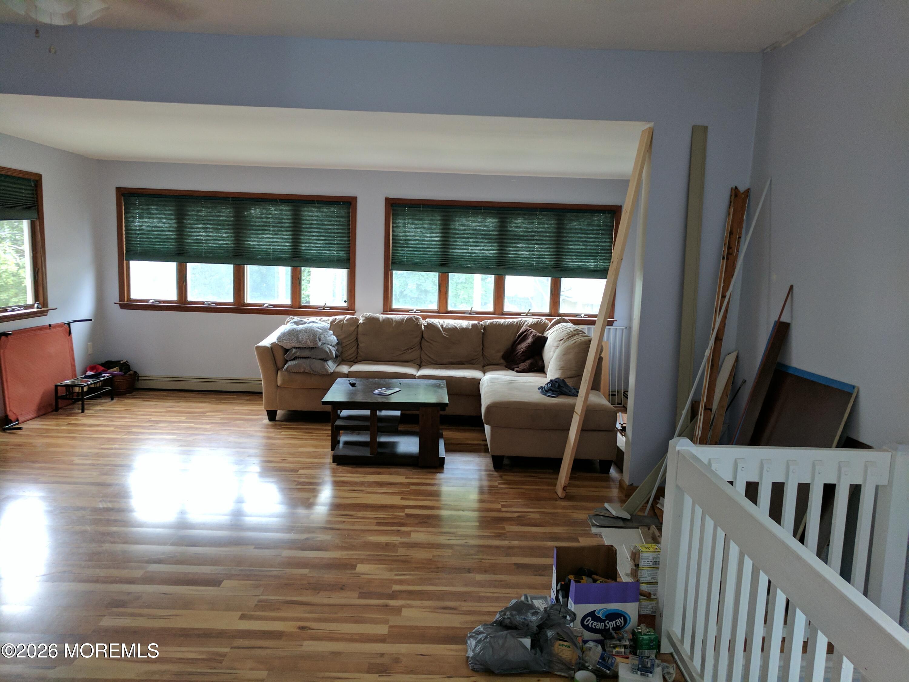 190 Jackson Street Matawan, NJ 07747 - Photo 15 of 24 a living room with furniture and a large window