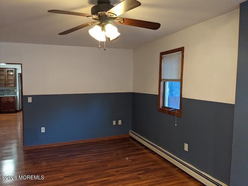 190 Jackson Street Matawan, NJ 07747 - Photo 16 of 24 a view of an empty room with wooden floor and a chandelier fan