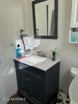 190 Jackson Street Matawan, NJ 07747 - Photo 19 of 24 a bathroom with a sink toilet and mirror