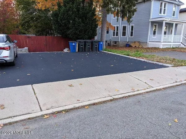 front view of a house with a street