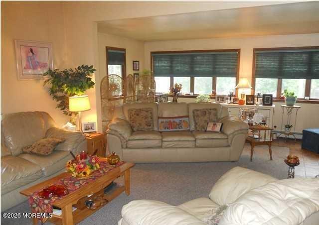 190 Jackson Street Matawan, NJ 07747 - Photo 3 of 24 a living room with furniture and a large window