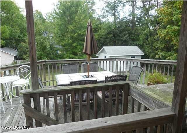 190 Jackson Street Matawan, NJ 07747 - Photo 9 of 24 a view of a wooden deck with furniture