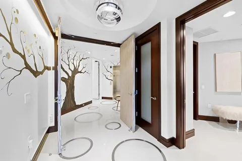 a bed room with a bed and a balcony