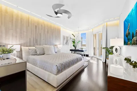 a view of a balcony with wooden floor