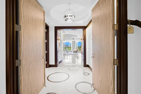 a dining room with furniture garden view and a potted plant