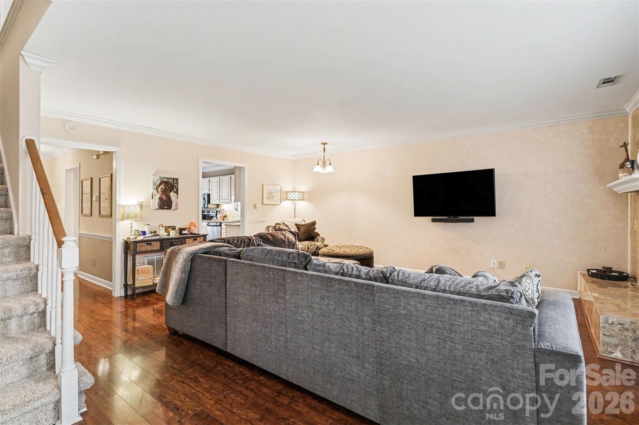 313 Wisteria Lane Kannapolis, NC 28083 - Photo 11 of 23 a living room with furniture and a flat screen tv