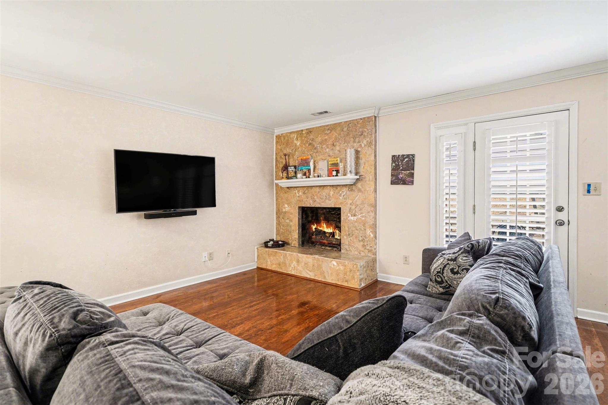 313 Wisteria Lane Kannapolis, NC 28083 - Photo 12 of 23 a living room with furniture and a flat screen tv