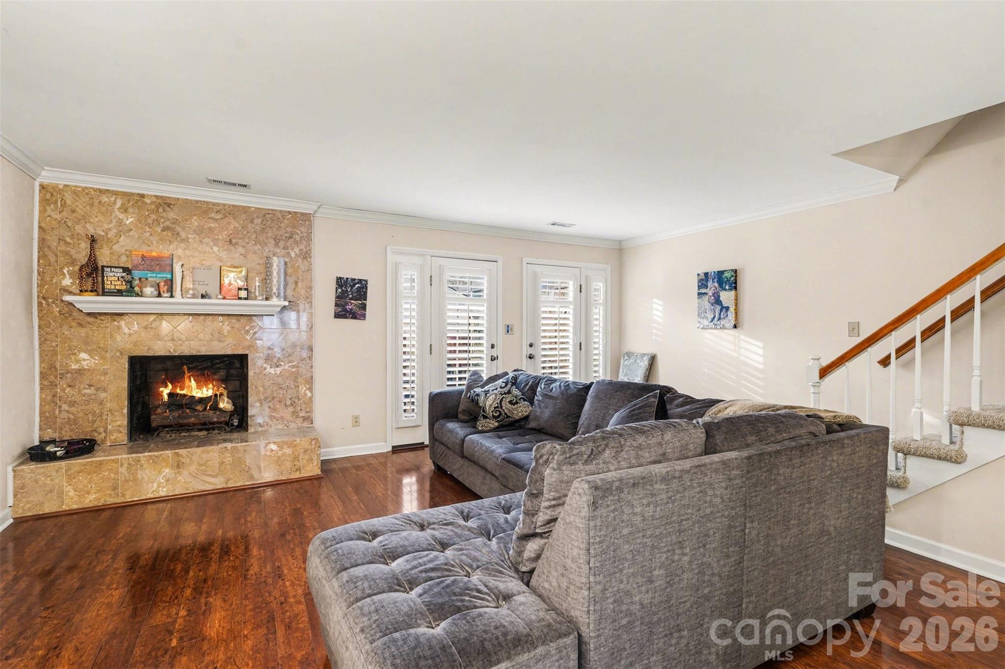 313 Wisteria Lane Kannapolis, NC 28083 - Photo 13 of 23 a living room with furniture and a fireplace