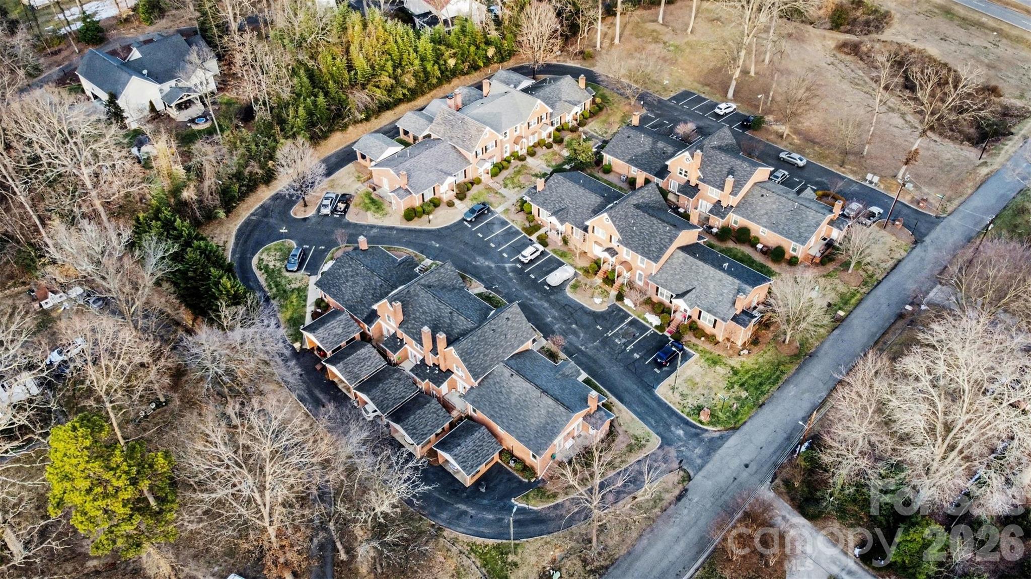 313 Wisteria Lane Kannapolis, NC 28083 - Photo 23 of 23 an aerial view of residential houses with outdoor space