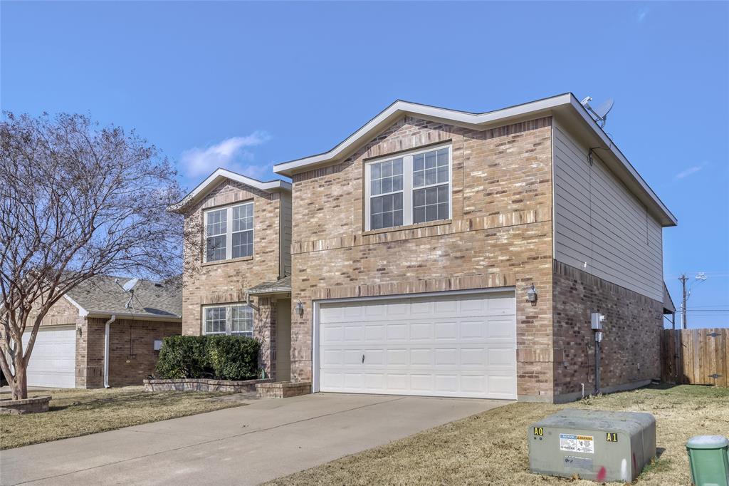2002 Pin Oak Trail Anna, TX 75409 - Photo 2 of 29 a front view of a house with a yard