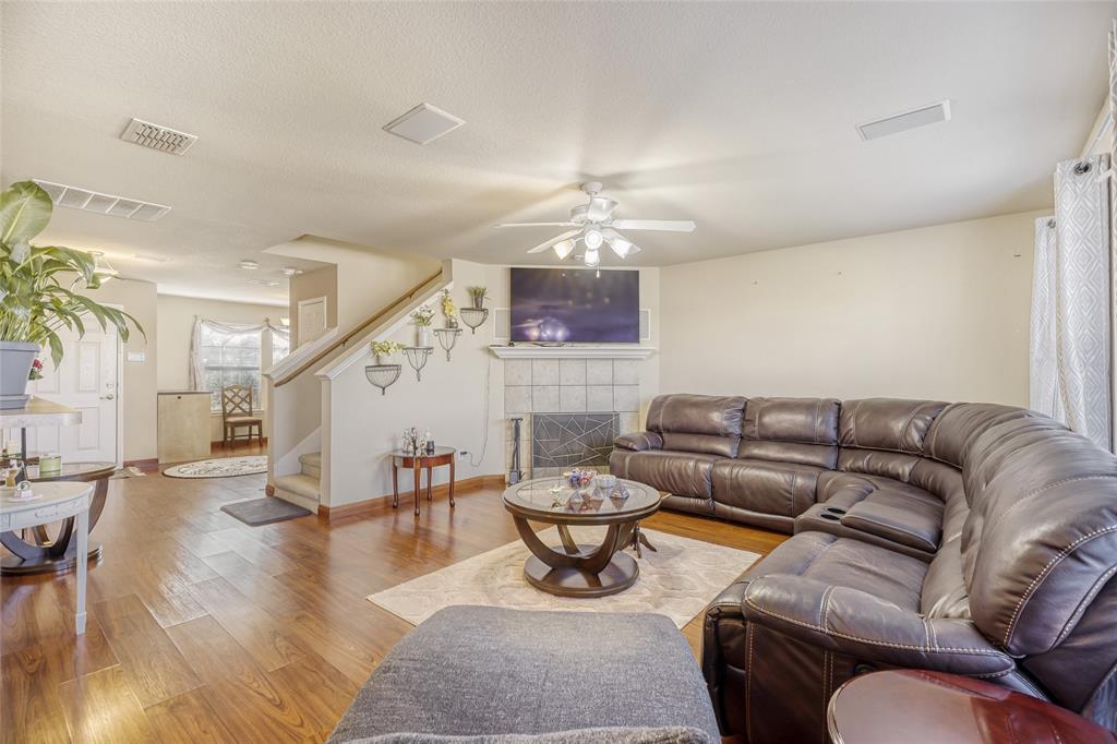 2002 Pin Oak Trail Anna, TX 75409 - Photo 7 of 29 a living room with furniture and wooden floor