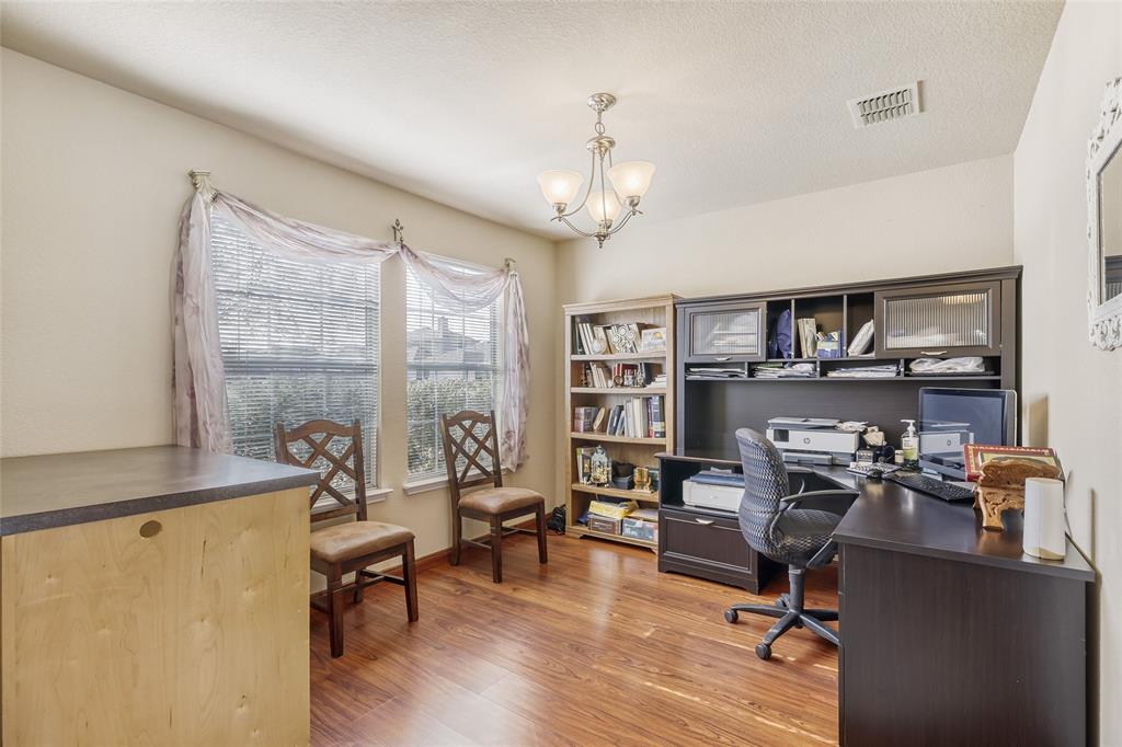 2002 Pin Oak Trail Anna, TX 75409 - Photo 10 of 29 a view of a livingroom with workspace and a window