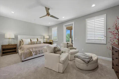 a bedroom with bed and window