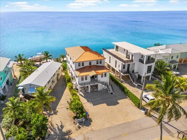 a bathroom with a window and a shower