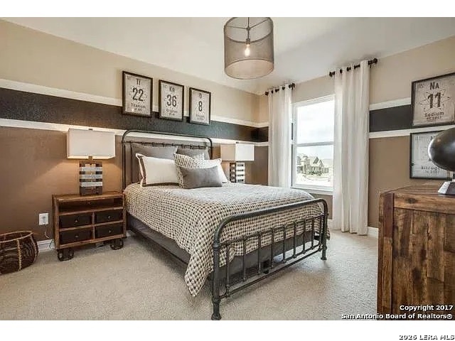 119 Aberdeen Boerne, TX 78015 - Photo 8 of 10 a bed room with a bed and a television