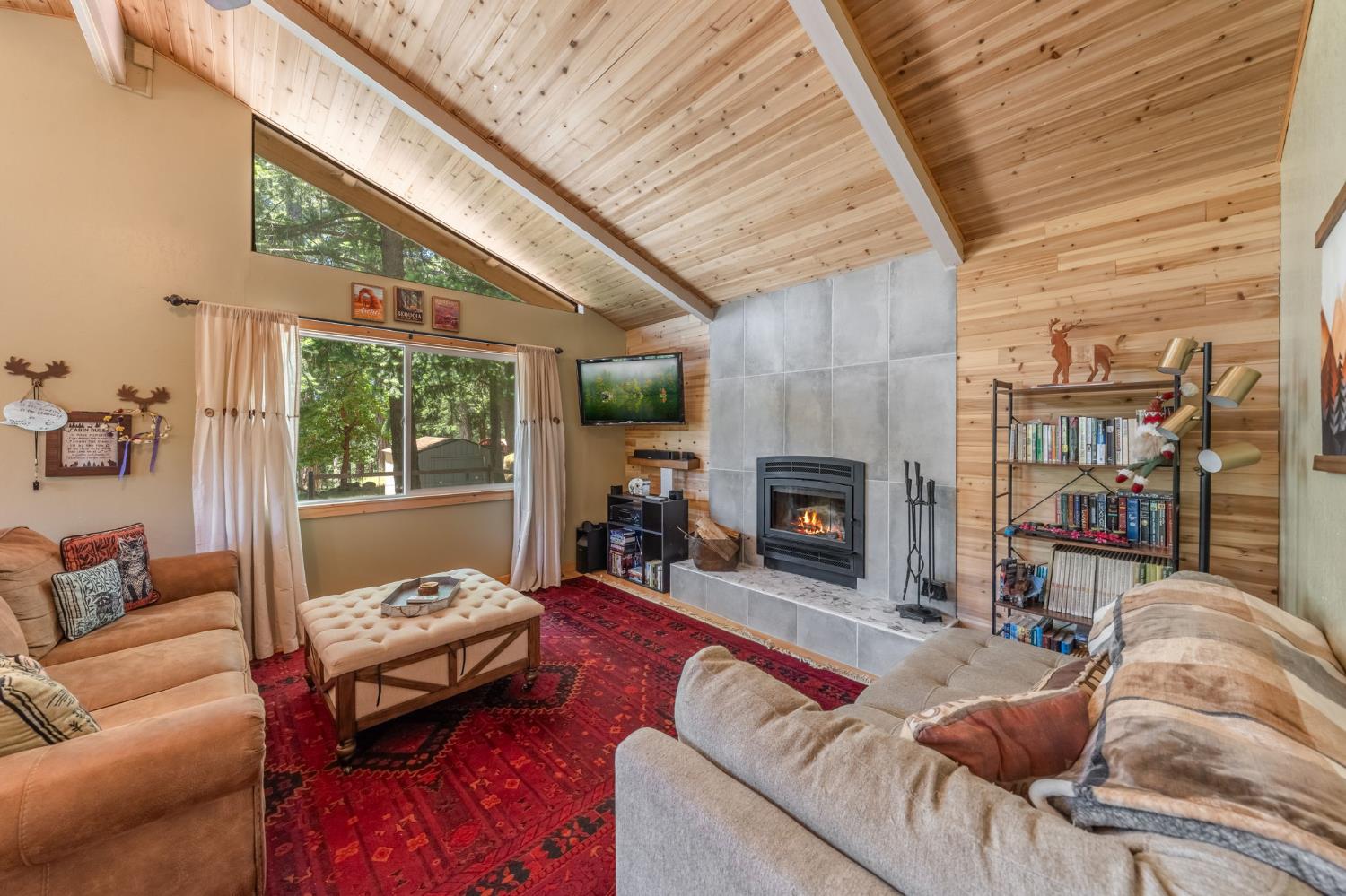 5341 Edelweiss Way Pollock Pines, CA 95726 - Photo 6 of 48 Snuggle Up Next to the Fireplace and Watch the Snow Fall Through the Picture Windows During Those Frosty, Winter Months