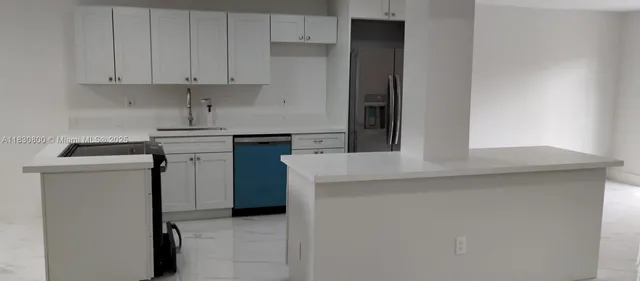 $429,900 | 9719 North New River Canal Road, Unit 308, Plantation, FL 33324