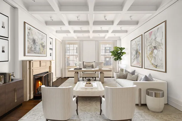 a view of a dining room with furniture and window