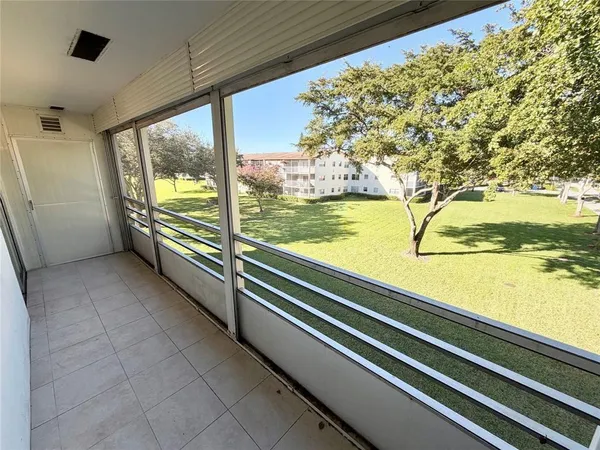 a view of a large window with an outdoor view
