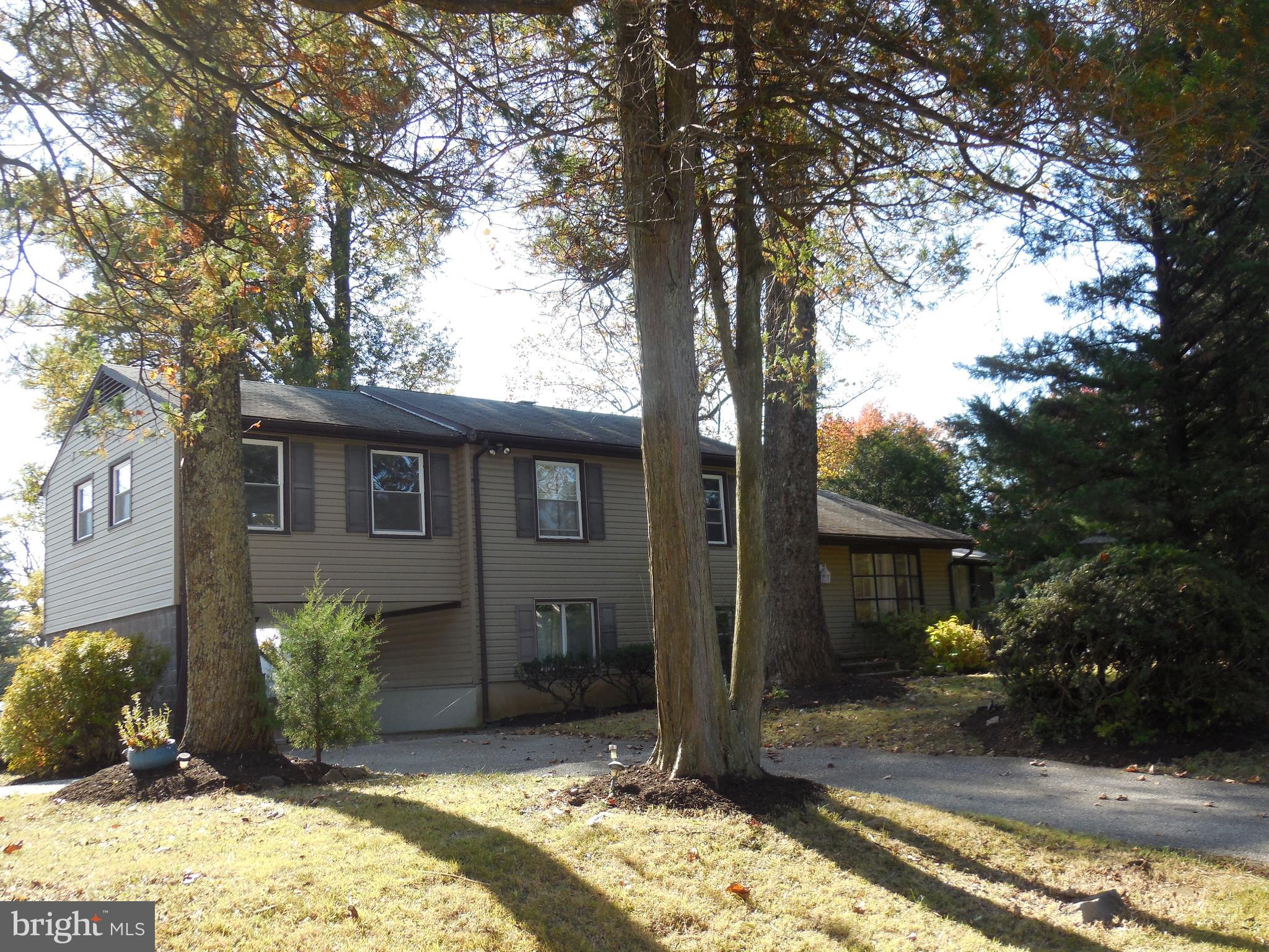 607 Church Road Reisterstown, MD 21136 - Photo 1 of 34 a view of a house with a yard