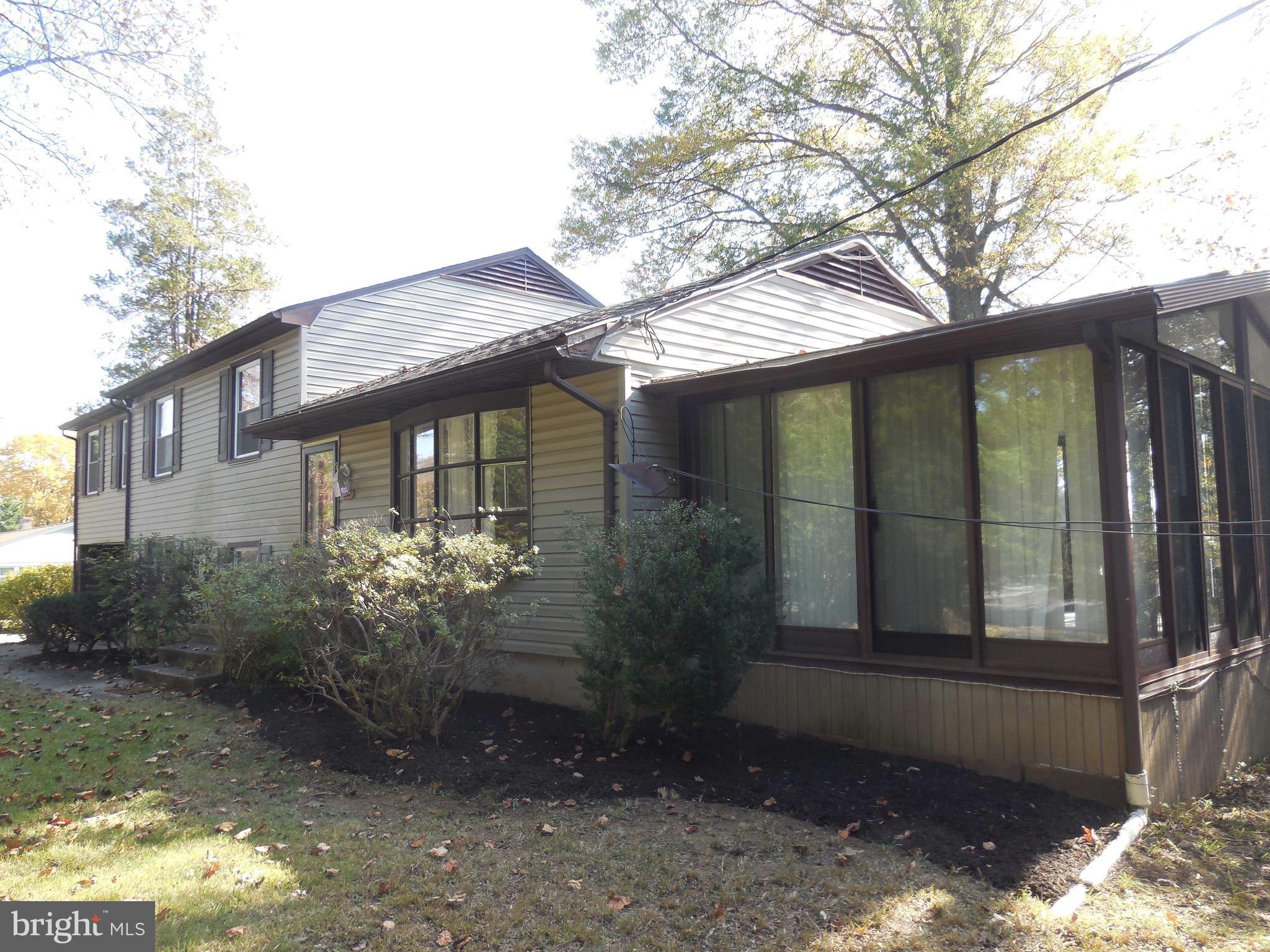 607 Church Road Reisterstown, MD 21136 - Photo 11 of 34 a front view of a house with garden