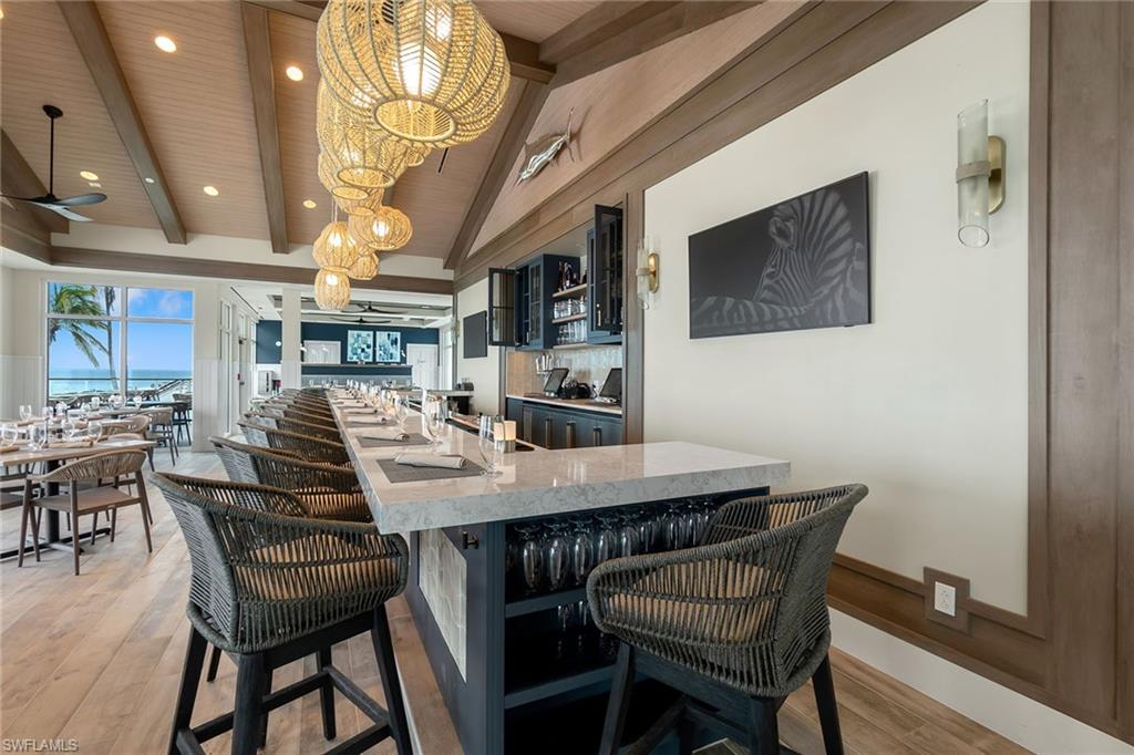 5100 Baybridge Boulevard, Unit 1503 Estero, FL 33928 - Photo 16 of 31 a view of a dining room with furniture