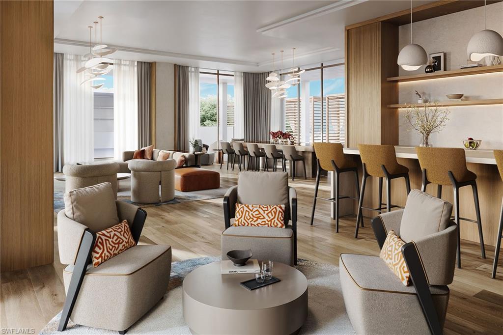 5100 Baybridge Boulevard, Unit 1503 Estero, FL 33928 - Photo 4 of 31 a living room with furniture and floor to ceiling windows