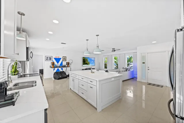 a view of living room with furniture and white walls