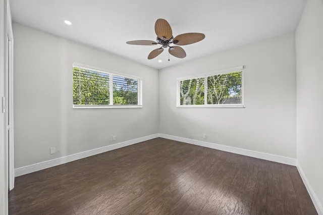 a view of a swimming pool with a garden