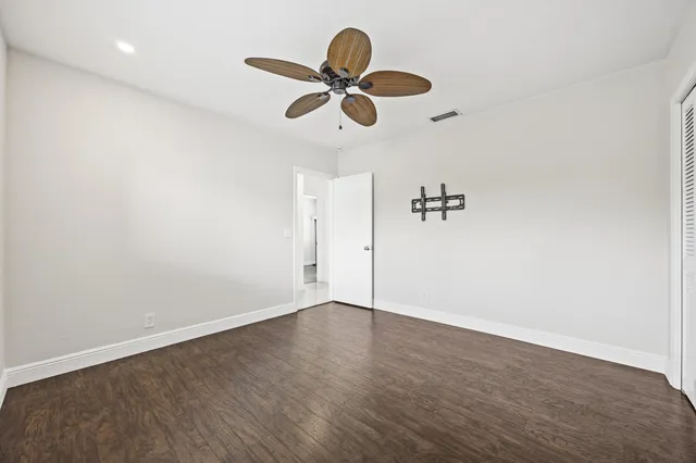 front view of a house with a swimming pool