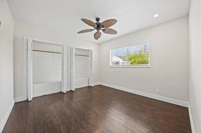 a view of a house with backyard sitting area and porch