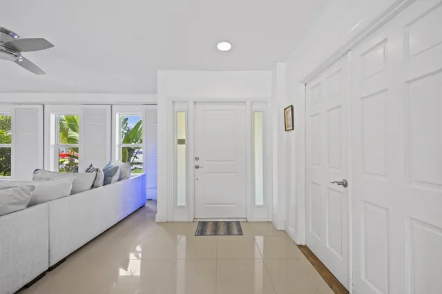 a kitchen with stainless steel appliances granite countertop a stove and a refrigerator